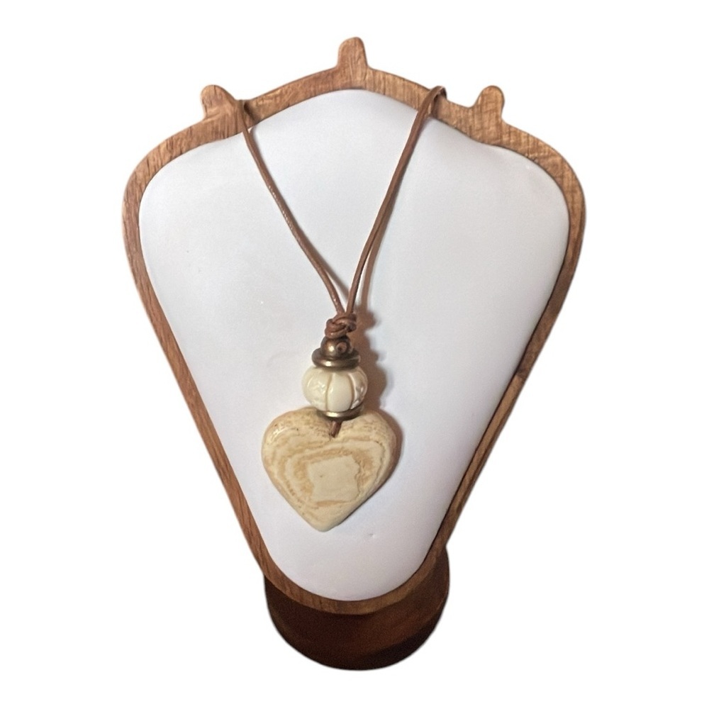 Heart Pendant Necklace with Cream and Brown Accents on leather rope